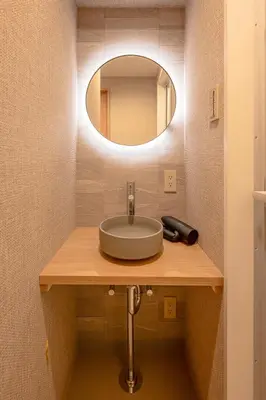 a bathroom with a sink and a mirror at 51A Momiji Newly Opened 3 minutes from Ayase Station East Exit Modern Welcome to Exam Candidates and Families Private Room Rental in Tokyo