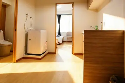 a bathroom with a tub and a shower in a room at Direct Skytree View I Easy Airport Access I New 2025 Building in Tokyo