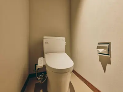 a bathroom with a white toilet in a room at illi Nuto Shinjuku in Tokyo