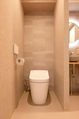 a bathroom with a white toilet in a room at 41A Sakura NEW OPEN 3 minutes from the east exit of Ayase Station Japanese modern sophisticated space private room Ueno and Asakusa 20 minutes in Tokyo
