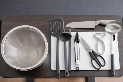 a table with utensils on a cutting board at Alley Tateishi in Tokyo