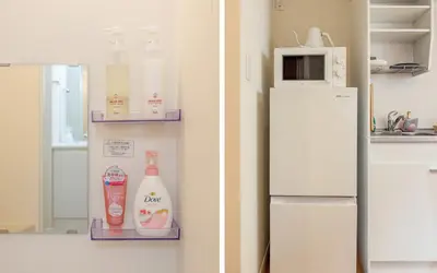 a refrigerator with bottles of milk and a microwave at Negishi 301-TT0030 in Tokyo