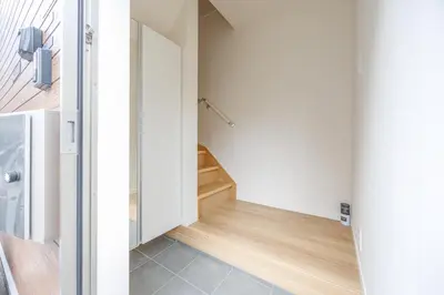 a small hallway with a staircase in a house at Negishi 301-TT0030 in Tokyo