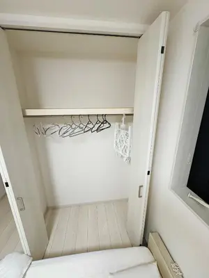 a small room with a closet with white walls at SkyTree View Hikifune Home 1F-105 2min walk to station in Tokyo