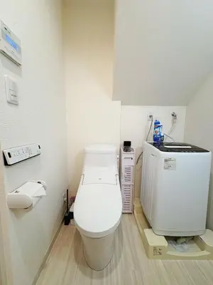 a bathroom with a white toilet in a room at SkyTree View Hikifune Home 1F-105 2min walk to station in Tokyo