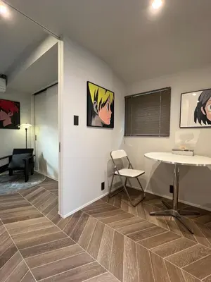 a room with a table and a table and chairs at Koenji Designer House, 3 bedrooms,100m2, 5min to Shinjuku in Tokyo