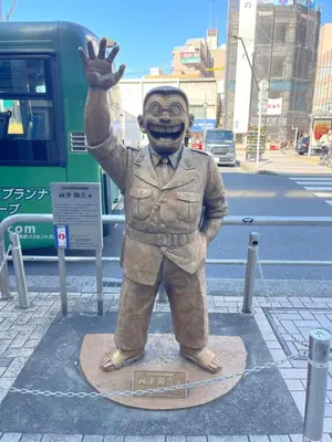 a statue of a man in a suit at 30 min to Ueno, Asakusa, Skytree, Akihabara, Ginza in Tokyo