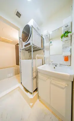 a kitchen with a white refrigerator and a sink at 30 min to Ueno, Asakusa, Skytree, Akihabara, Ginza in Tokyo