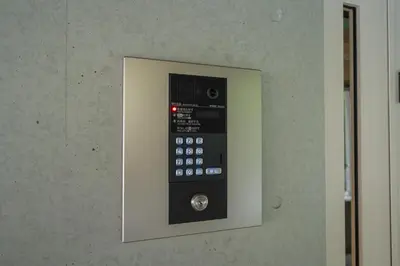 a control panel on the wall of an elevator at unito residence WASEDA West in Tokyo