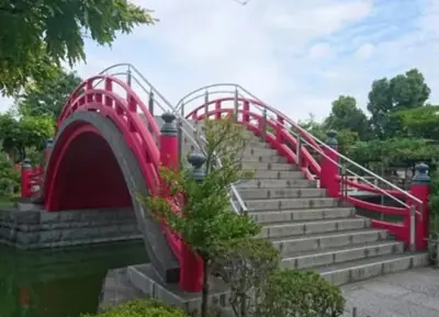 a red bridge over a set of stairs at Soresta INN \u7be0\u5d0e in Tokyo