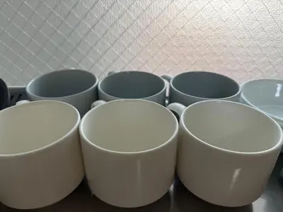 a group of cups sitting on top of a table at Kitashinjuku 2DK-2F-B in Tokyo