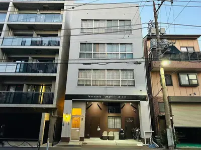 a building on a street in front of a building at Vacances Skytree Plaza in Tokyo