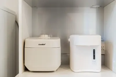 two white machines sitting next to each other in a room at Promotion \u6c60\u888b\u522b\u5885 \u5168\u65b03\u5c42\u697c\u72ec\u680b\u522b\u5885 \u5bb6\u7684\u611f\u89c9 3\u5367\u5ba41\u5385Brand new 3-story detached villa with a homey feel 3 rooms \u8fd1\u5546\u5708 \u8bbe\u5907\u9f50\u5168 \u76f4\u8fbe\u65b0\u5bbf \u94f6\u5ea7 \u6d89\u8c37 \u4e0a\u91ce \u8868\u53c2\u9053 \u54c1\u5ddd in Tokyo