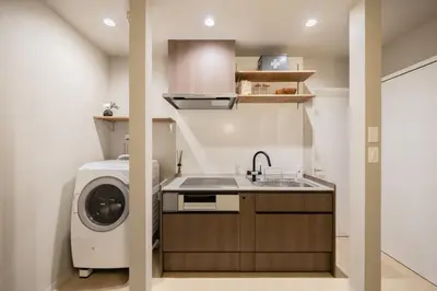 a kitchen with a sink and a washing machine at HAN'S EBISU Hanare - Shibuya - Entire Renovated House in Tokyo