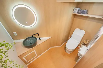 a small bathroom with a toilet and a mirror at Komorebi Asakusa 202 Cozy 6P Stay The 77 House Tokyo in Tokyo