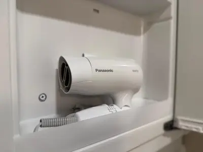 a camera in the wall of a bathroom at PRISM Inn Ikegami Kamata in Tokyo