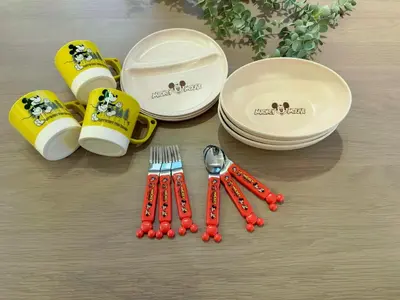 a table with chopsticks and a fork and a plate at \u8535 The KURA in Urayasu