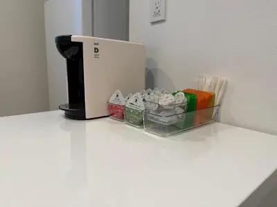 a coffee maker sitting on top of a counter at \u8535 The KURA in Urayasu