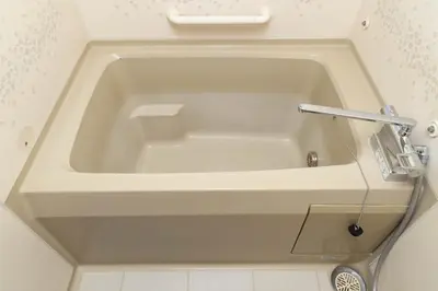 a white bath tub in a bathroom with a sink at LINKAGE STAY Chitose Funabashi in Tokyo