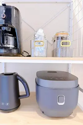a mixer and a coffee pot on a shelf at Bright Skytree View Apartment,6 Min Walk to Kinshicho Station in Tokyo