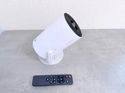 a wii remote control sitting next to a remote controller at Bright Skytree View Apartment,6 Min Walk to Kinshicho Station in Tokyo