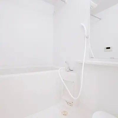 a white shower in a bathroom with a sink at Bright Skytree View Apartment,6 Min Walk to Kinshicho Station in Tokyo