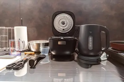 a coffee maker sitting on top of a table at T-home\u666f T-home KEI in Tokyo