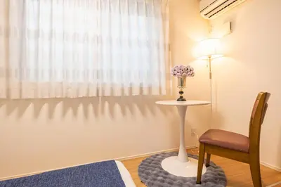 a room with a table and a chair and a window at Oshiage 3-chome Entire House Near Skytree in Tokyo