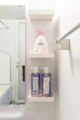a bathroom with three bottles of soap and a detergent at Spacious Skytree Stay, 8 Guests, Asakusa 11 mins, Modern Renovation, 8-min Walk to Station in Tokyo