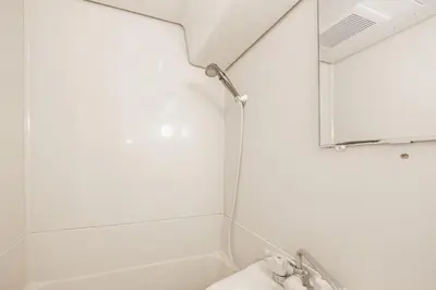 a bathroom with a tub and a sink and a mirror at 8 mins walk to Ikebukuro, 6 mins to Kanamecho Station, Max 2 people, Direct access to Tokyo, Shinjuku, Shibuya, Ueno 503 in Tokyo