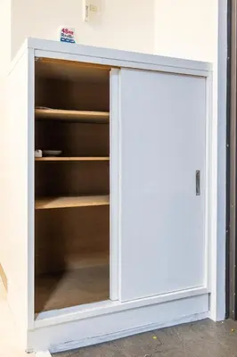 a white cabinet with a door in a room at 8 minutes on foot from Ikebukuro, 6 minutes on foot from Kanamecho Station, Maximum 2 people, Direct to Tokyo, Shinjuku, Shibuya, Ueno 102 in Tokyo
