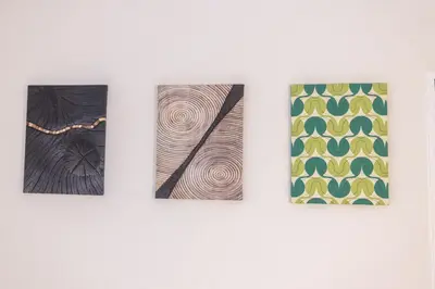 three pieces of art hanging on a wall at 8 minutes on foot from Ikebukuro, 6 minutes on foot from Kanamecho Station, Maximum 2 people, Direct to Tokyo, Shinjuku, Shibuya, Ueno 102 in Tokyo