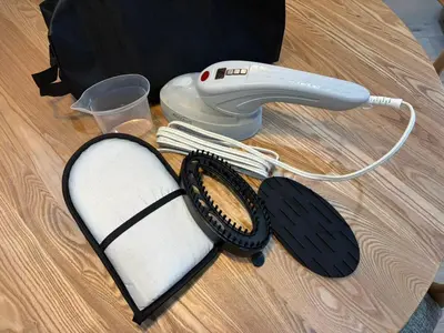 a hair dryer and a phone on a table at \u9577\u671f\u5272\u304c\u304a\u5f97 \u6700\u59274\u540d \u897f\u5927\u5cf6\u99c5\u5f92\u6b693\u5206 \u65b0\u5bbf\u76f4\u901a20\u5206\u6771\u4eac\u6ede\u5728\u306b\u6700\u9069TDR \u30b9\u30ab\u30a4\u30c4\u30ea\u30fc\u597d\u30a2\u30af\u30bb\u30b9HOTEL DREAM MUSIC Lavender TOKYO in Tokyo