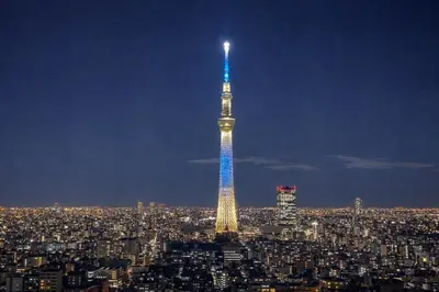 a view of the eiffel tower lit up at night at \u99c5\u5f92\u6b691\u5206 \u6210\u7530\u7a7a\u6e2f\u304b\u3089\u76f4\u901a\u99c5 \u7fbd\u7530\u7a7a\u6e2f\u304b\u3089\u76f4\u901a\u99c5 THE\u6771\u4eac\u548c\u98a8\u8cb8\u5207\u65c5\u9928 \u8fd1\u30b9\u30ab\u30a4\u30c4\u30ea\u30fc\u6d45\u8349\u4e0a\u91ce\u9280\u5ea7\u30c7\u30a3\u30ba\u30cb\u30fc 86\u30a4\u30f3\u30c1\u6620\u753bTV\u5ba4 \u9ad8\u901f\u5149Wifi \u9577\u671f\u5272\u5f15 \u516b\u5e83N01 in Tokyo