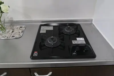 a stove top oven sitting on top of a counter at M15 Aoba Great location within walking distance of Ikebukuro in Tokyo