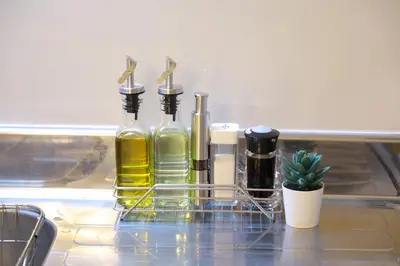 a group of bottles of oils sitting on a counter at \u9577\u671f\u5272\u304c\u304a\u5f97 \u6700\u59274\u540d \u897f\u5927\u5cf6\u99c5\u5f92\u6b693\u5206 \u65b0\u5bbf\u76f4\u901a20\u5206\u6771\u4eac\u6ede\u5728\u306b\u6700\u9069TDR \u30b9\u30ab\u30a4\u30c4\u30ea\u30fc\u597d\u30a2\u30af\u30bb\u30b9HOTEL DREAM MUSIC Melody Sky in Tokyo
