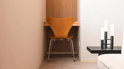 a chair sitting at a desk in a room at \u82e5\u8449\u30db\u30c6\u30eb in Tokyo