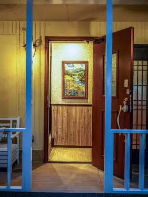 a door leading into a room with a painting on the wall at tsukiji 2min,V101,Ginza 10min in Tokyo