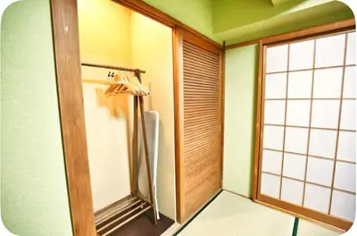 a small bathroom with a shower and a window at Alice Room\u677f\u6a4b501 in Tokyo