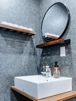 a bathroom with a sink and a mirror at tsukiji 2min,V201,Ginza 10min in Tokyo