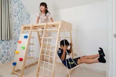 a boy and a girl playing in a bunk bed at Vacation Stay Koiwa in Tokyo