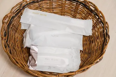 a basket filled with white toilet papers at Shinjuku,Higashi Shinjuku Sta, 5min walk,WiFi in Tokyo