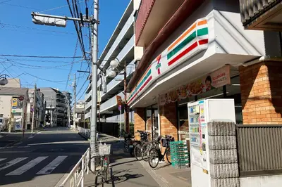 a building with bikes parked outside of it on a street at SunRiseStay Shibuya\u6da9\u8c37 in Tokyo