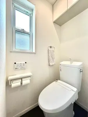 a white toilet in a bathroom with a window at Spacious 3-Bedroom Villar and parking - Central Tokyo nearby to Shinjuku, Shibuya, Ginza in Tokyo