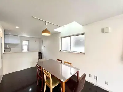 a dining room with a table and chairs at Spacious 3-Bedroom Villar and parking - Central Tokyo nearby to Shinjuku, Shibuya, Ginza in Tokyo