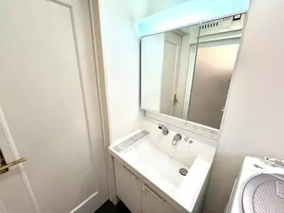 a bathroom with a sink and a mirror at Spacious 3-Bedroom Villar and parking - Central Tokyo nearby to Shinjuku, Shibuya, Ginza in Tokyo
