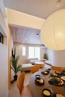 a living room with a table with food on it at \u672c\u753a3b\u30db\u30c6\u30eb in Tokyo