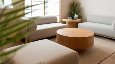 a living room with a couch and a coffee table at \u672c\u753a3b\u30db\u30c6\u30eb in Tokyo