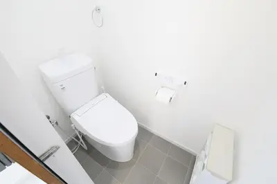 a white bathroom with a toilet in a room at \u56db\u3064\u6728\u6238\u5efa2165 in Tokyo