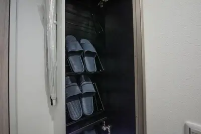 a cupboard with at Boa Sorte Hotel AD0515 in Tokyo